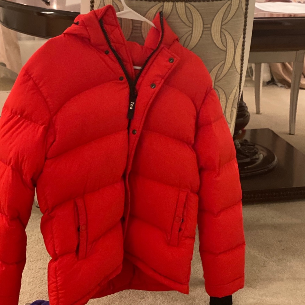 TNA super puff red size small. Great condition sells for 225.00. Great deal